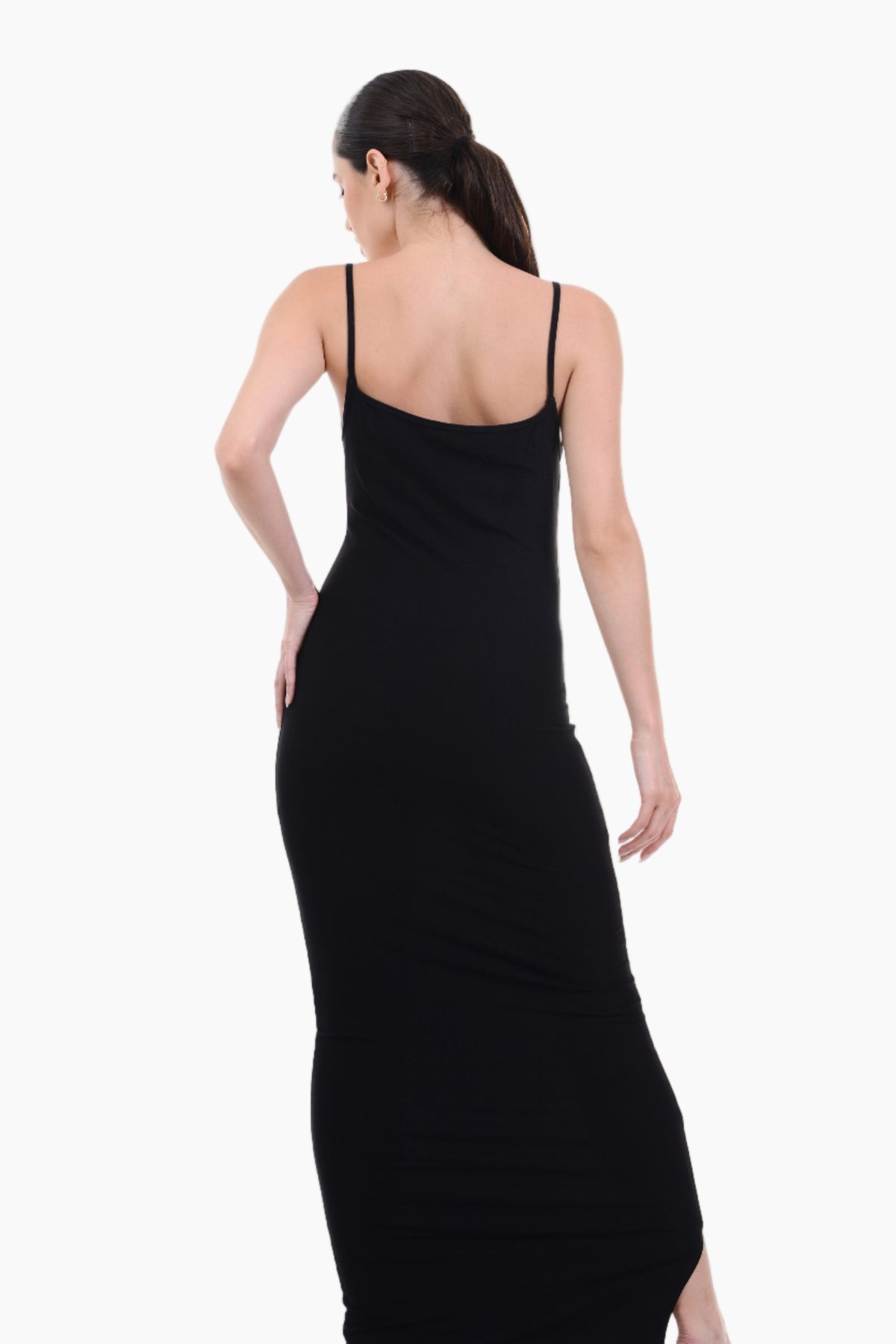 Woman wearing a black slip dress