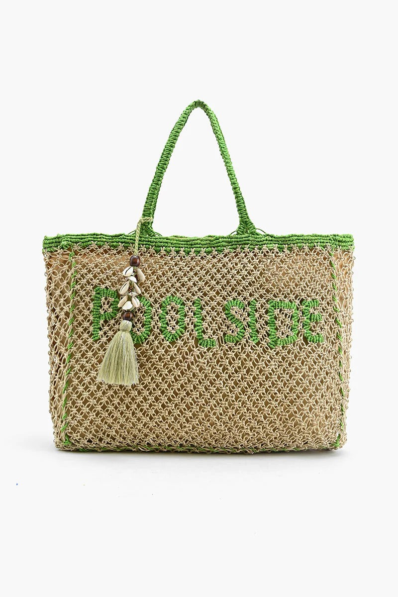 Woven bag with 'Poolside' text and tassel on a white background