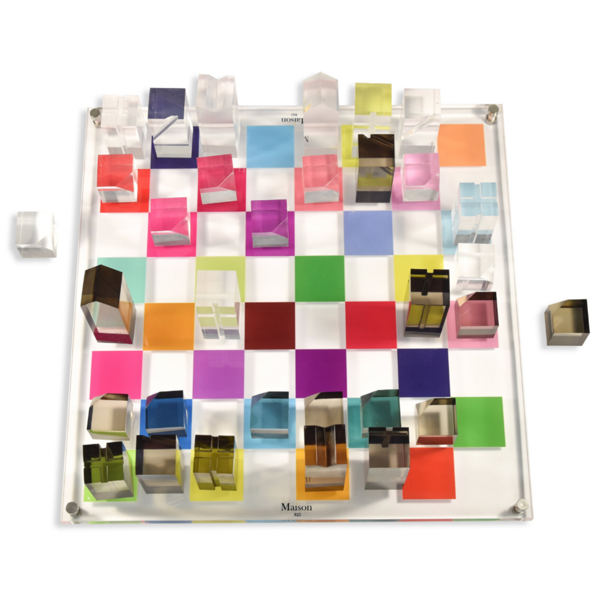 Colorful square tiles on a grid with a white background