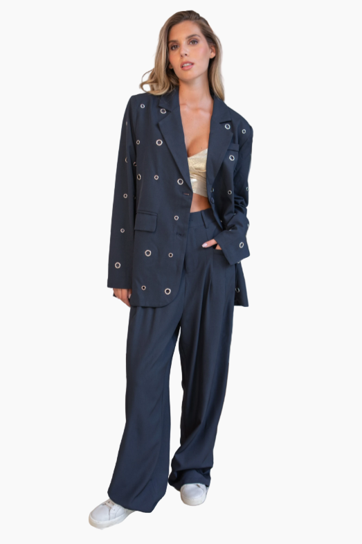Woman wearing a navy blue suit