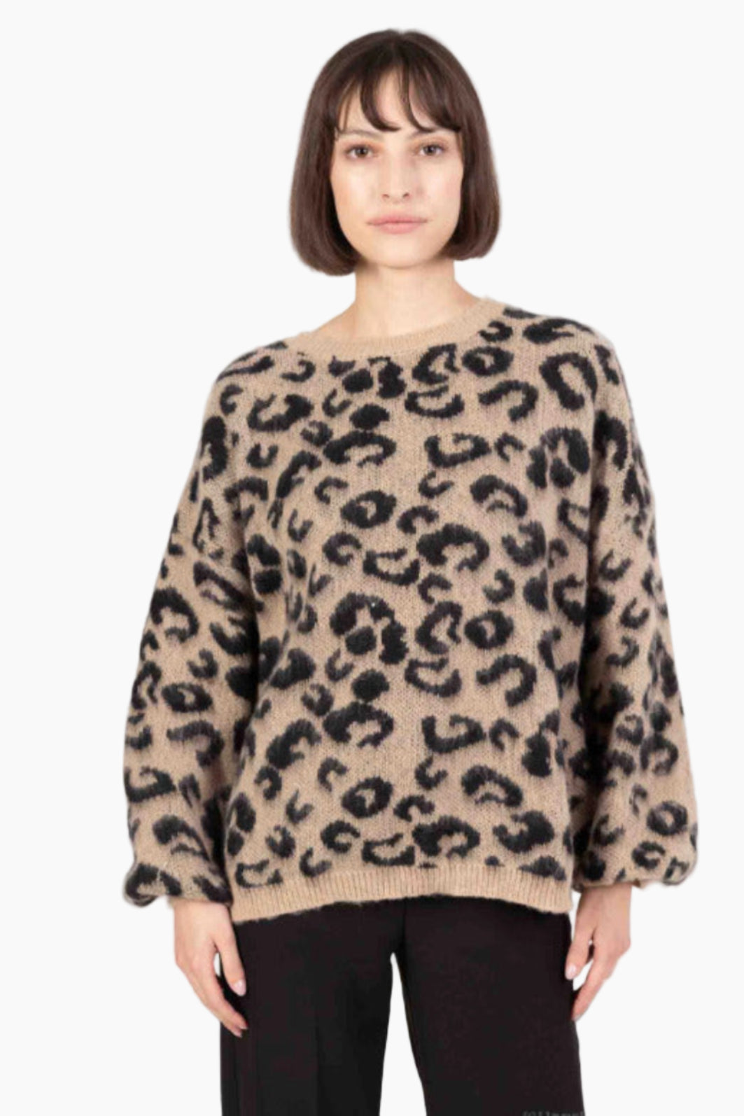 Woman wearing a leopard print sweater