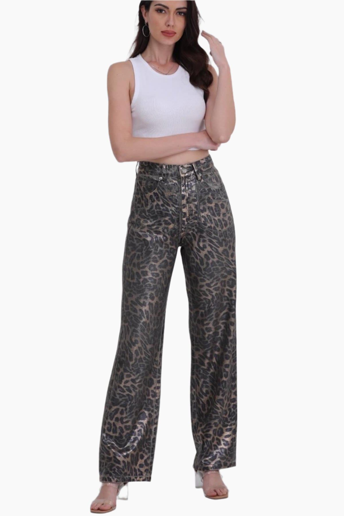 Woman wearing leopard print pants and a white top