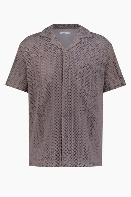 Short-sleeve shirt with a subtle pattern