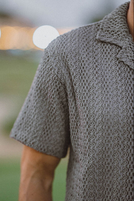 Close-up of a textured gray shirt