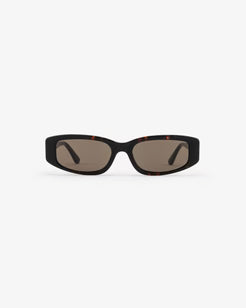 Sunglasses with black frame and dark lenses on a white background