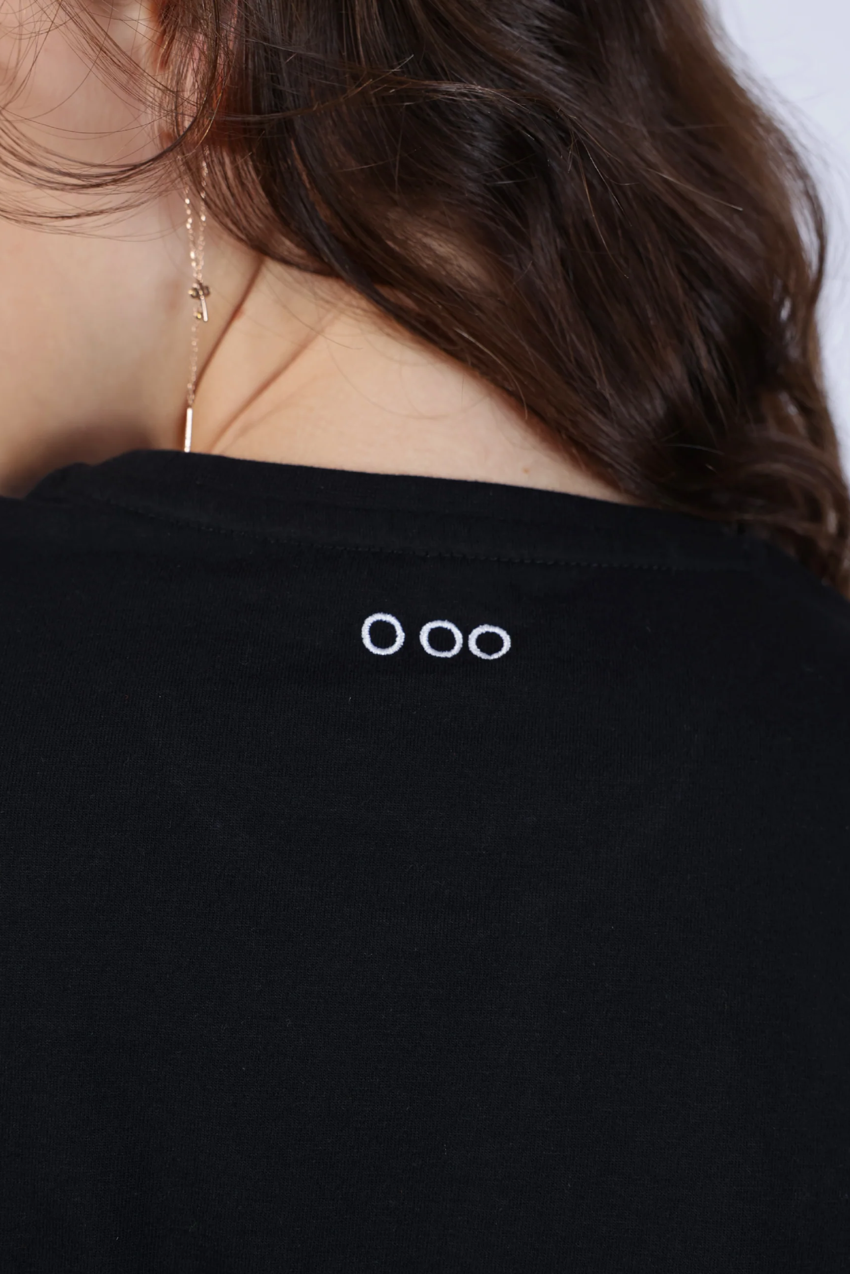 Black garment with white text