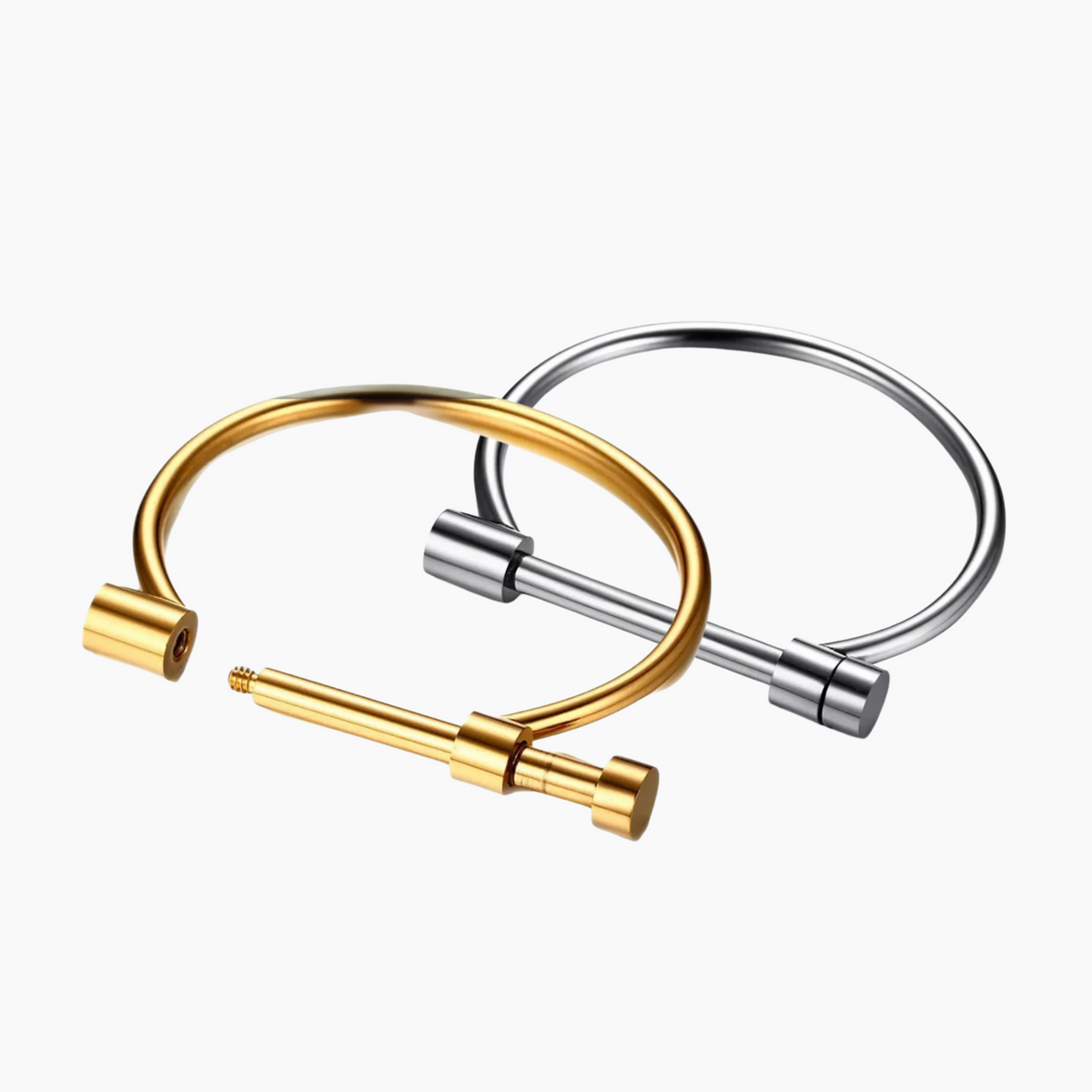 Gold and silver bangles on a white background