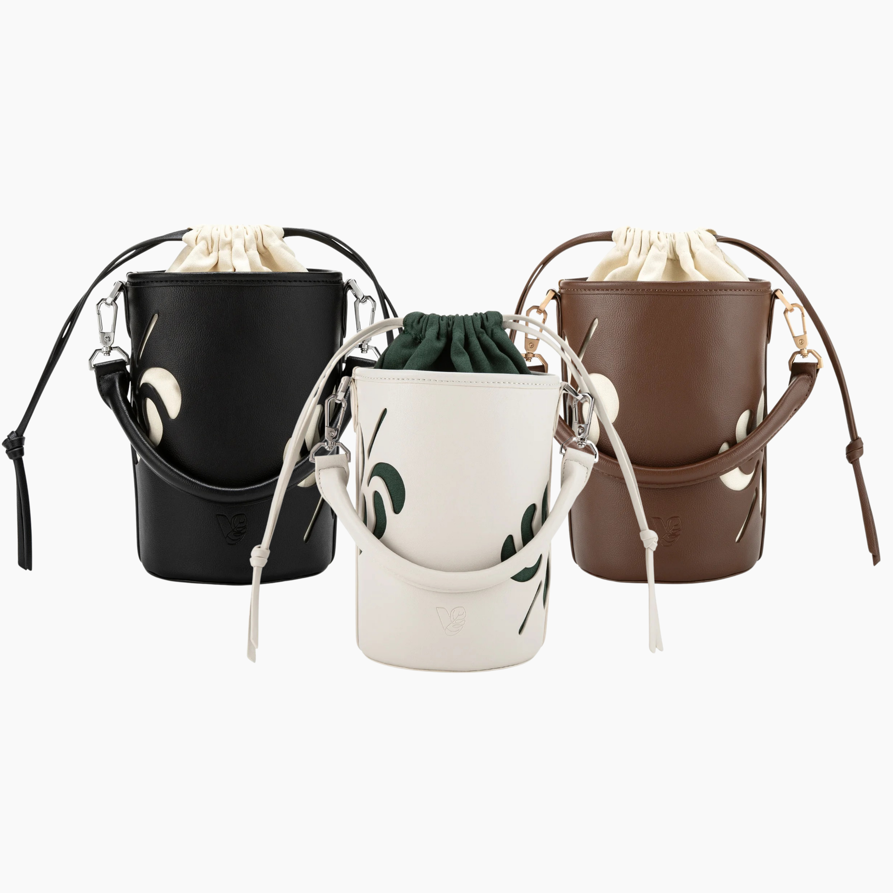 Three drawstring bags in black, white, and brown on a white background