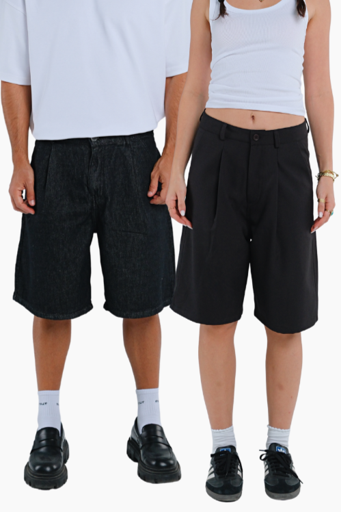 Two people wearing black pleated shorts