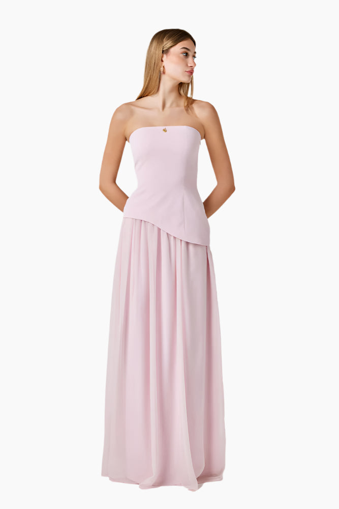 Woman wearing a strapless pink gown