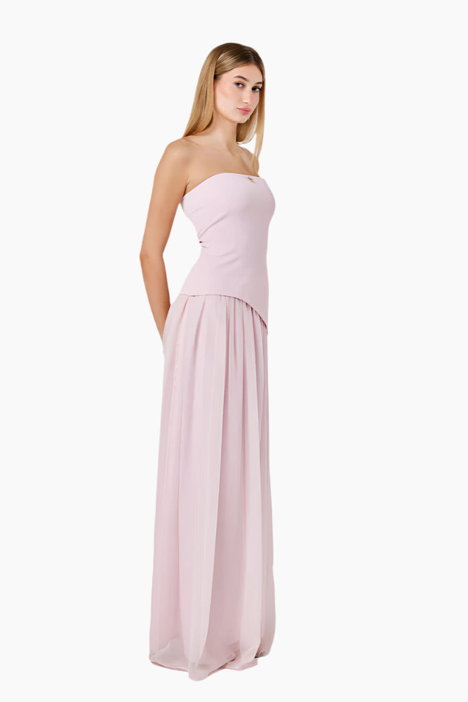 Woman wearing a strapless pink gown