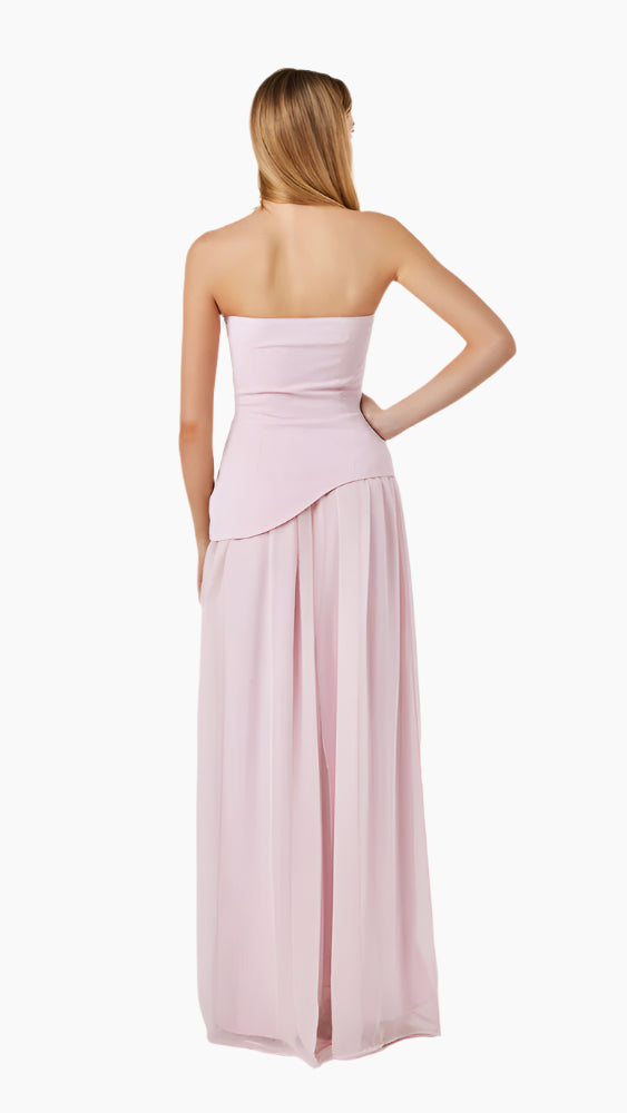 Woman wearing a strapless pink gown