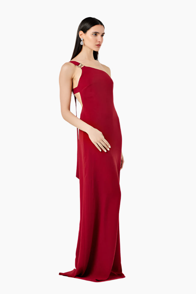 Woman wearing a red one-shoulder dress