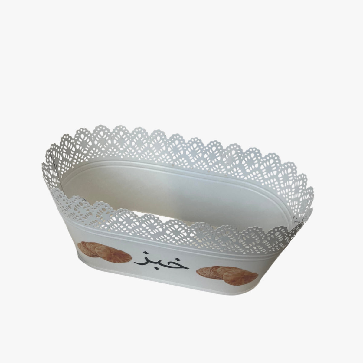A white ceramic bread basket with a lace pattern design and Arabic script.