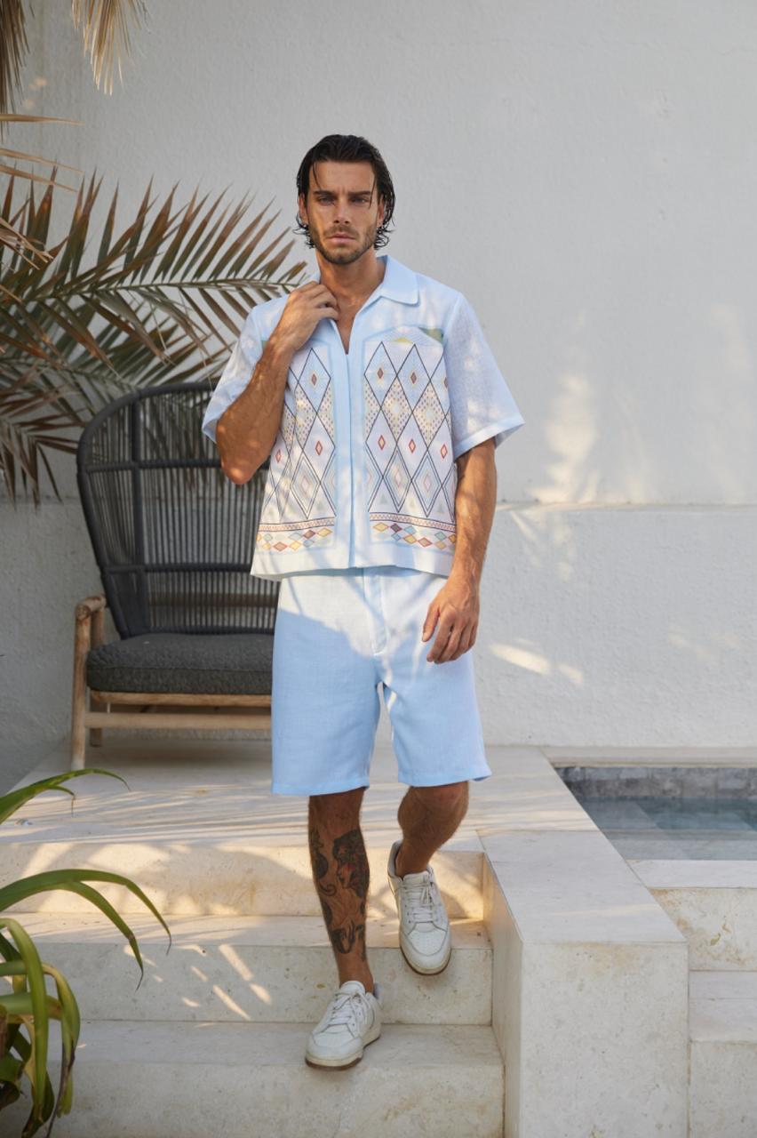 men wearing a matching light blue patterned t-shirt and short