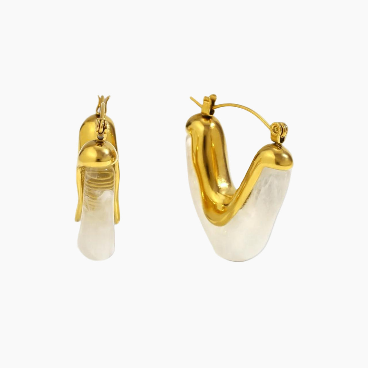 Gold hoop earrings with white stones on a white background