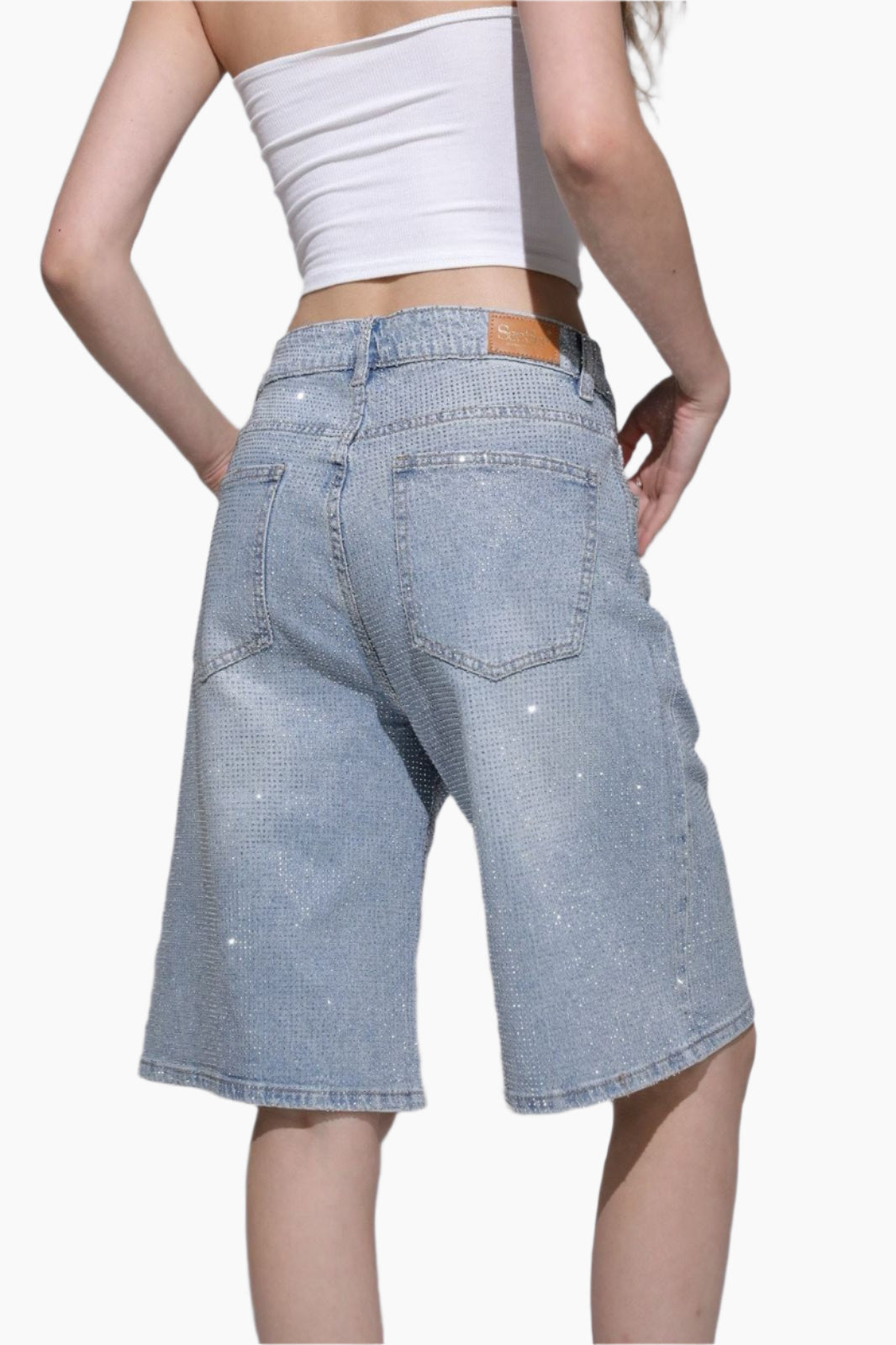 Light blue denim shorts worn by a person