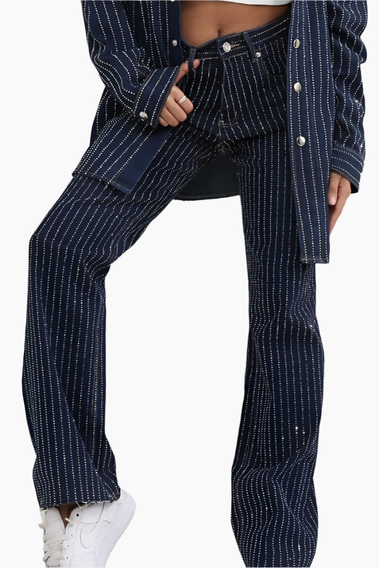 Navy pinstripe suit with white sneakers