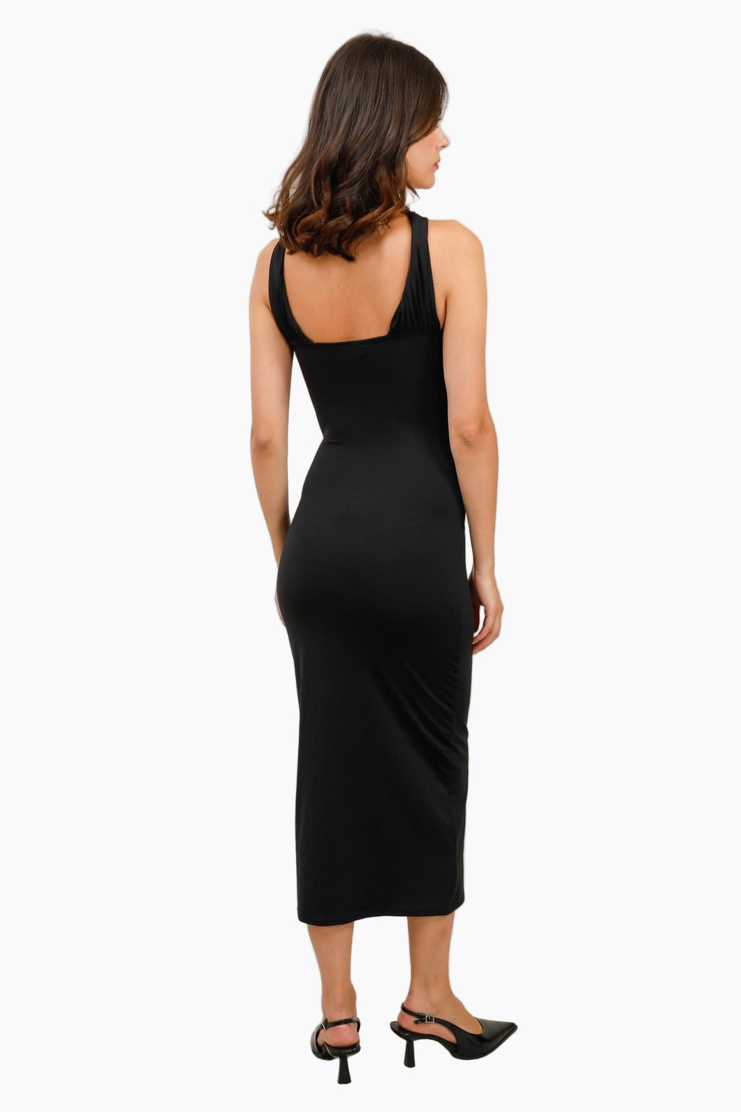 Woman wearing a black sleeveless dress