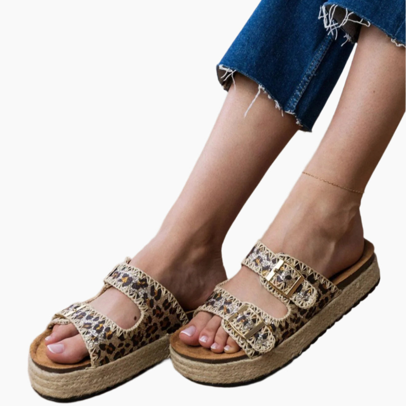 Leopard print sandals worn with denim jeans
