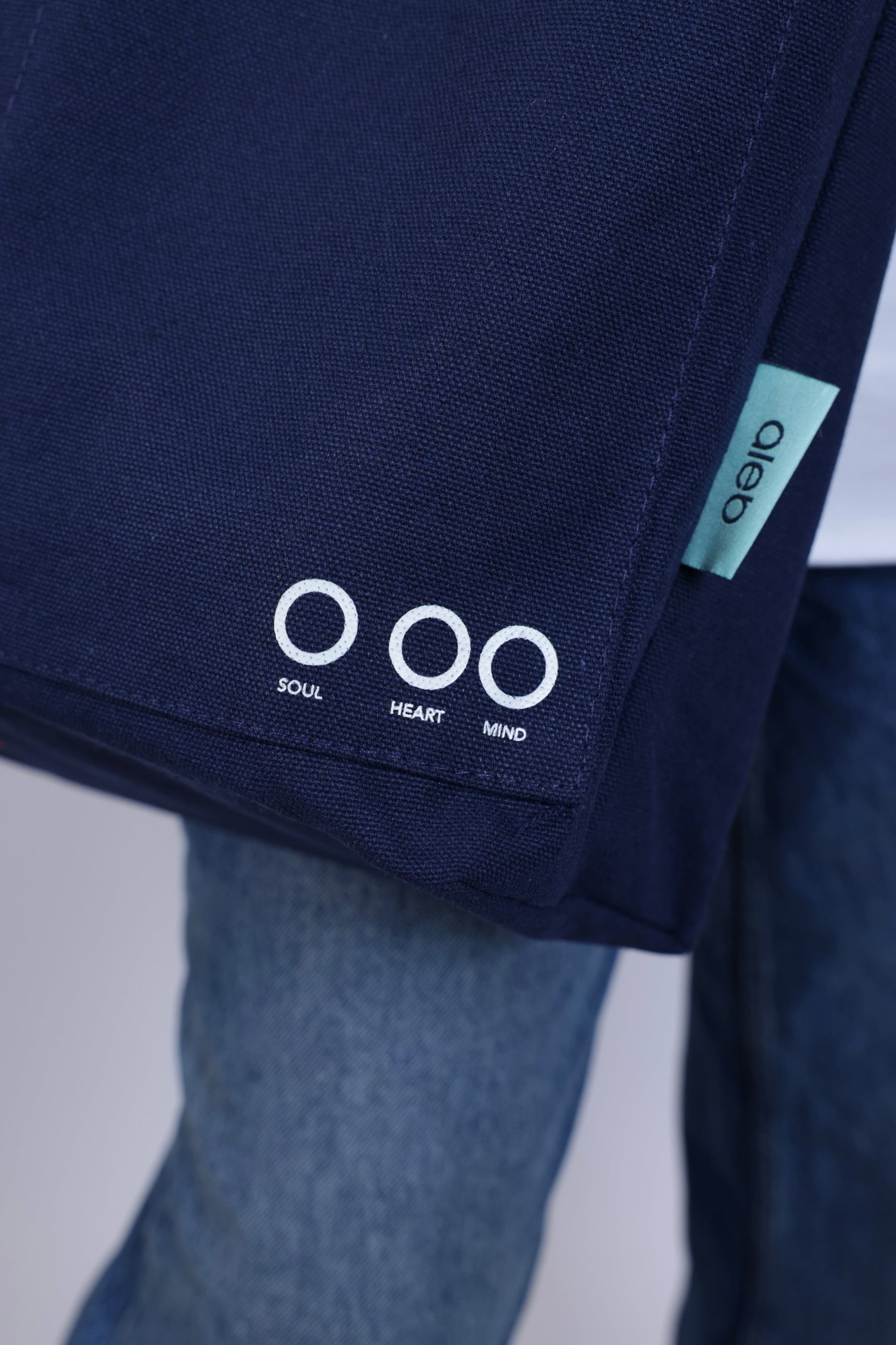 Person wearing a navy blue bag "When was your last check in?" - Unisex Tote Bag, soul , heat and mind