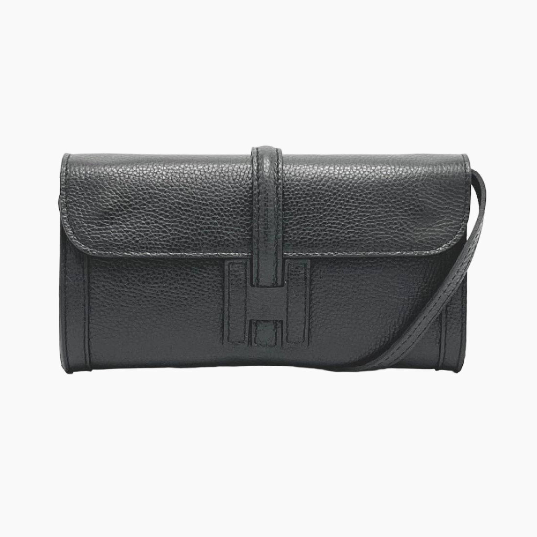 Black leather handbag with a visible brand logo