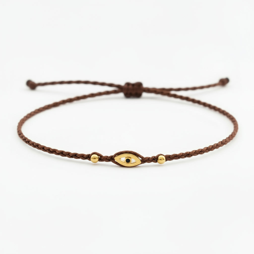 brown eye bracelet, Handmade 925 sterling silver bracelet, Gold plated in 24k with handmade wax cord braid and zircon.
Adjustable closure and size.