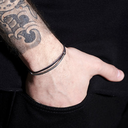 Handmade Sterling Silver 925 Bracelet with wax cord and embossed bar.