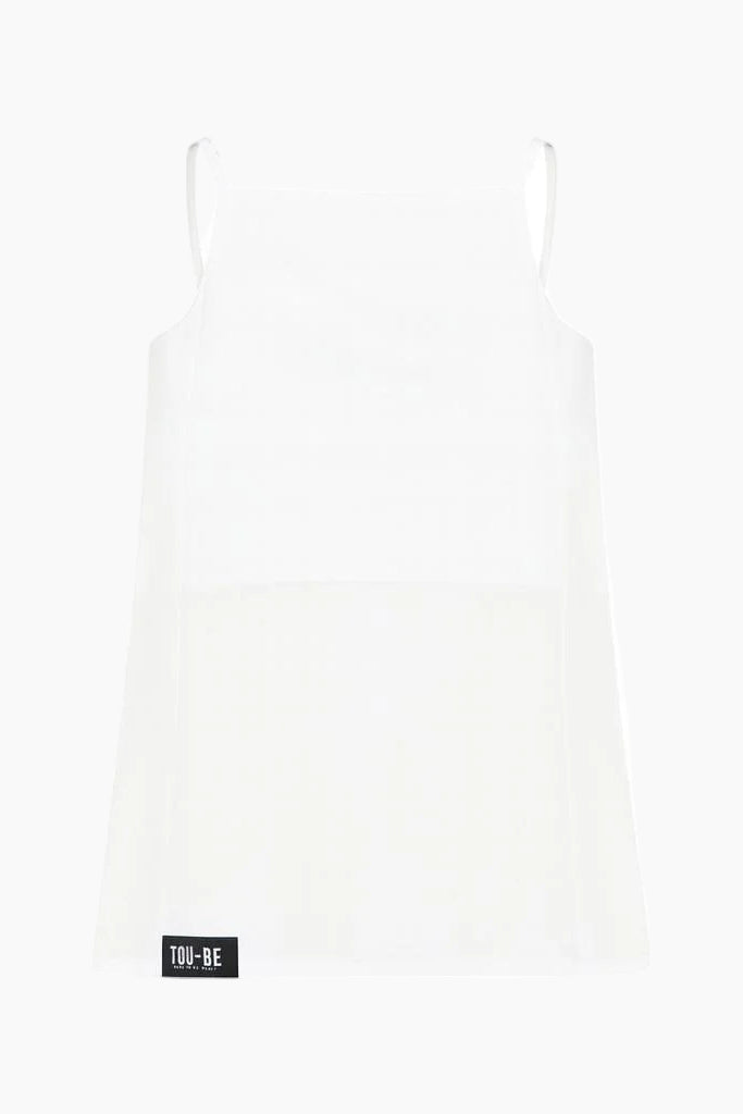 White slip dress with a brand label on a white background