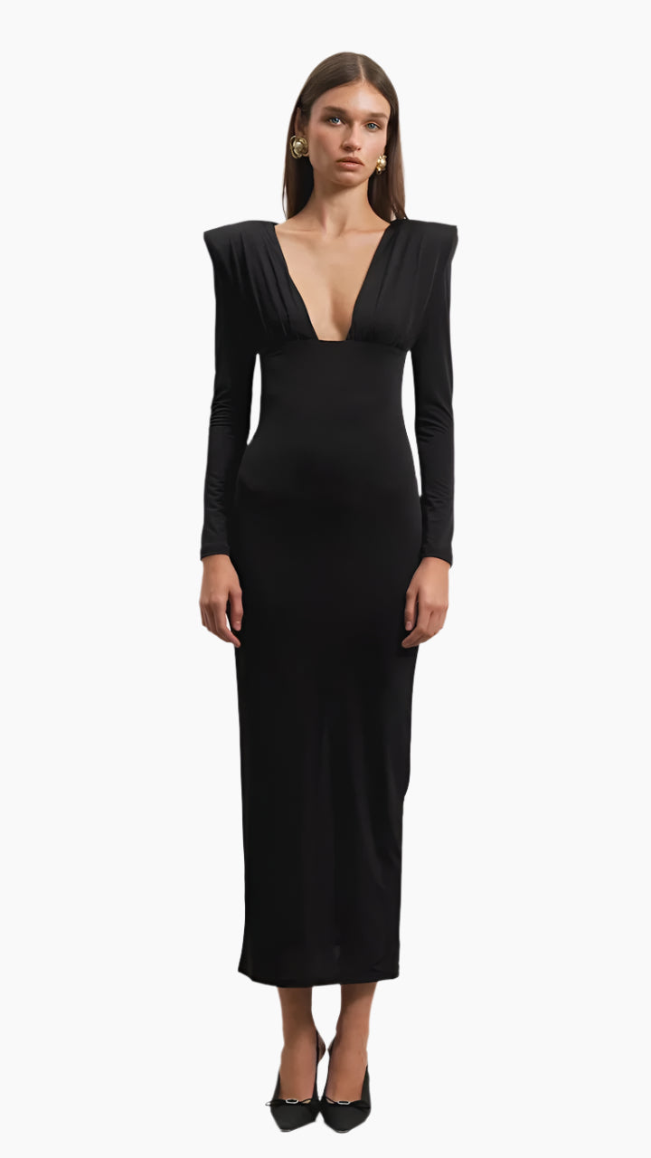 Woman wearing a black long-sleeve dress
