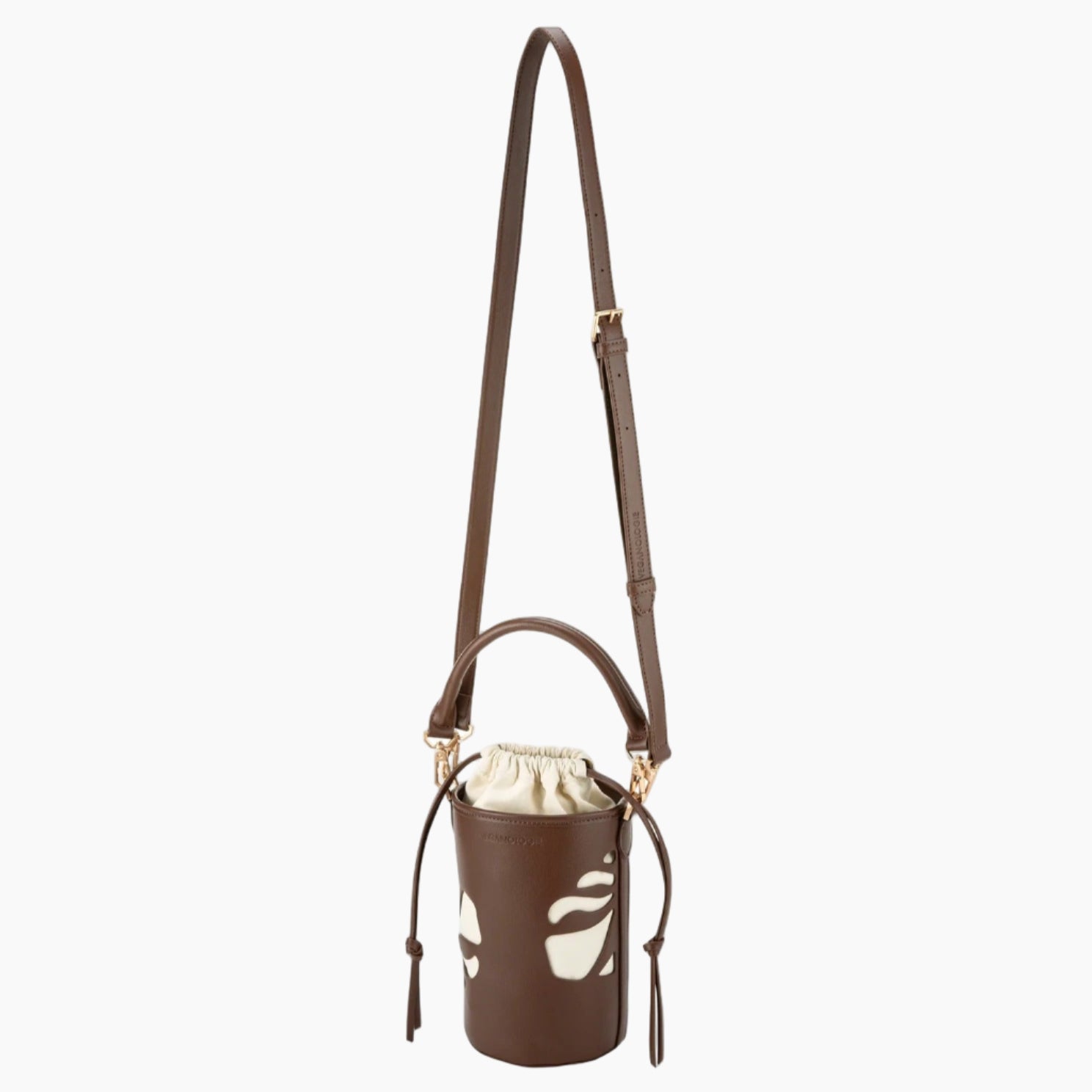 Brown leather crossbody bag with white floral pattern on a white background