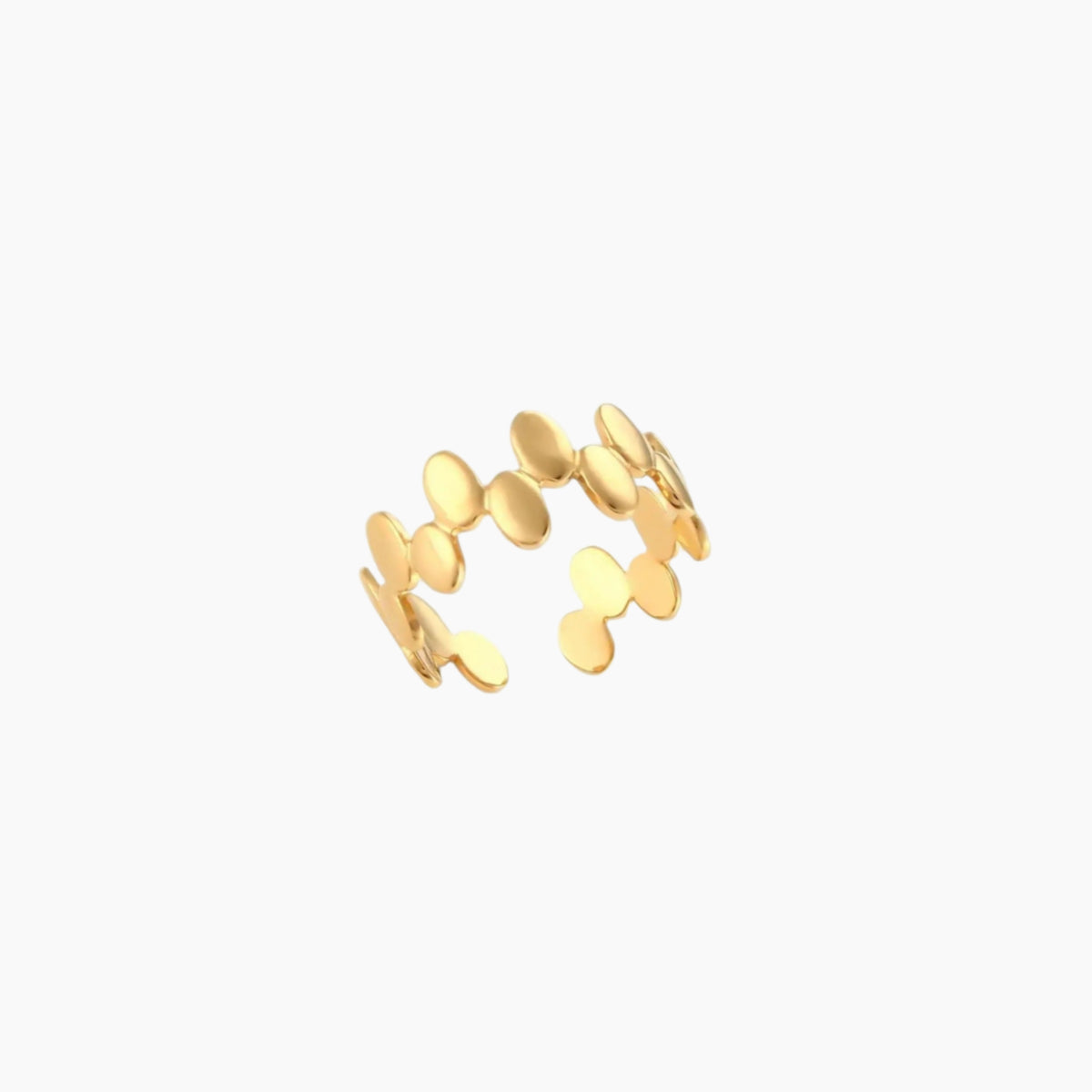Gold ring with circular design on a white background