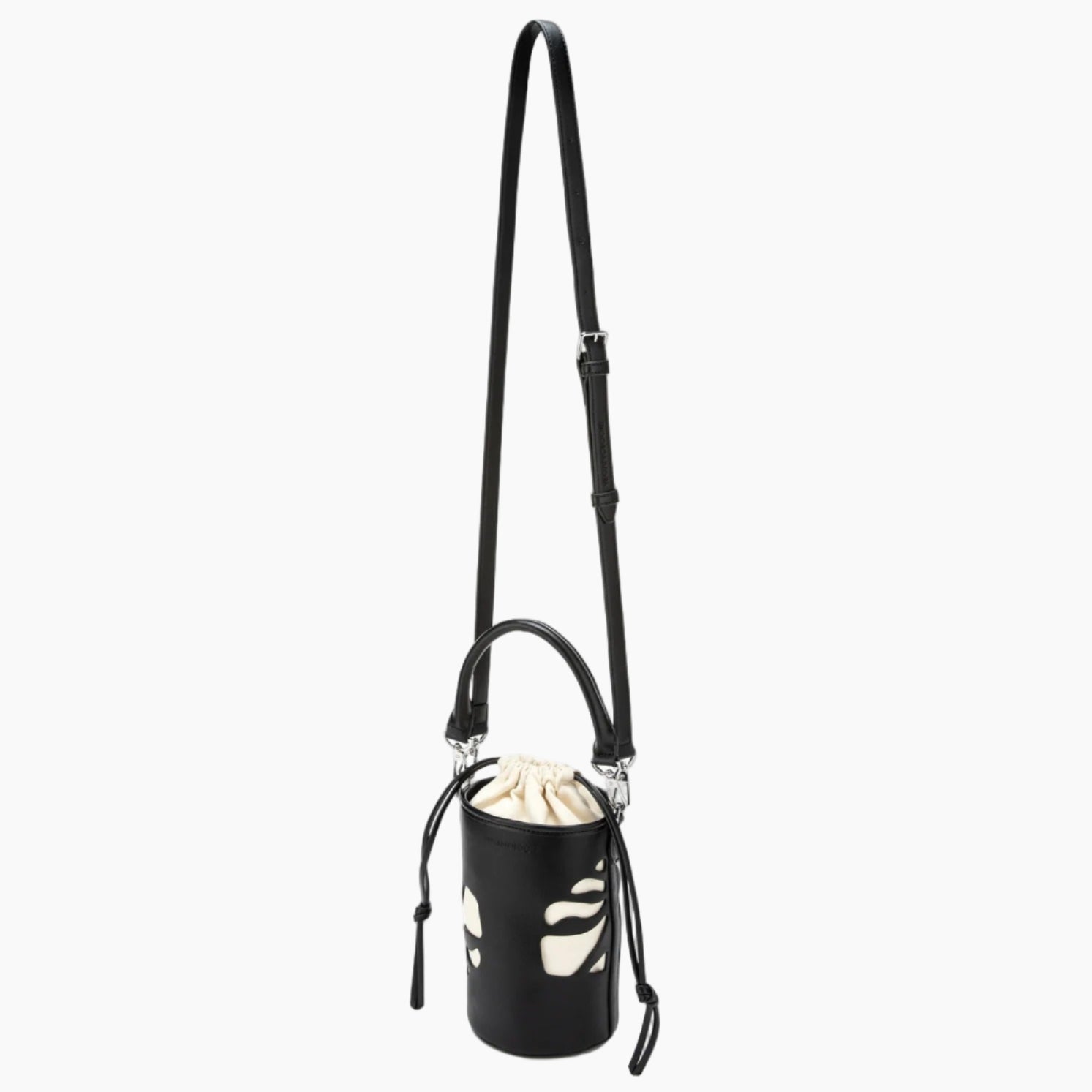 Black bucket bag with floral design on a white background