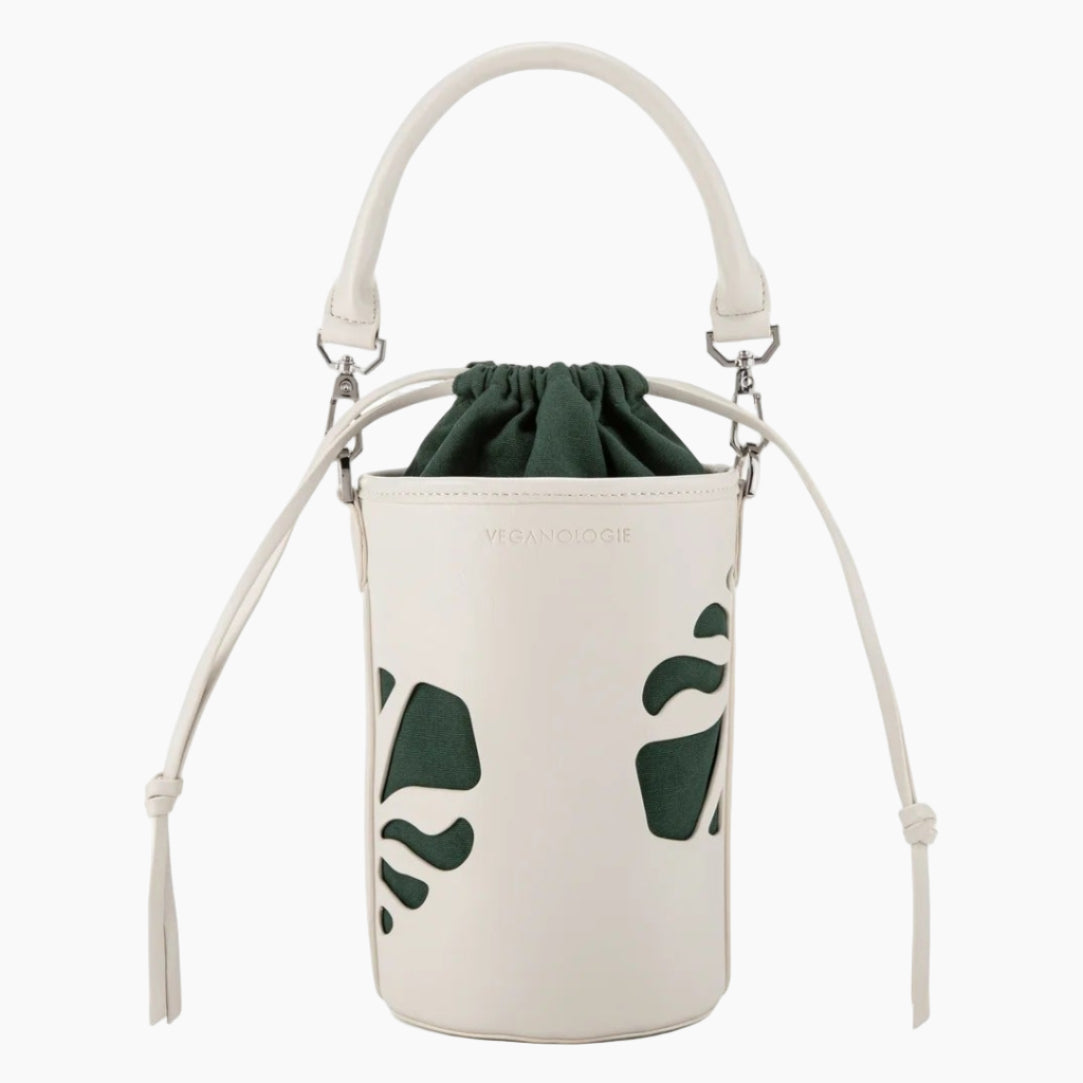 White drawstring bag with green leaf patterns on a white background