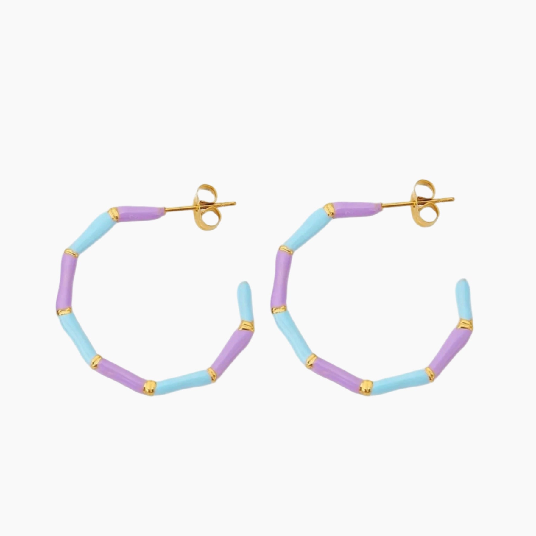 Hoop earrings with pastel blue and purple bands on a white background