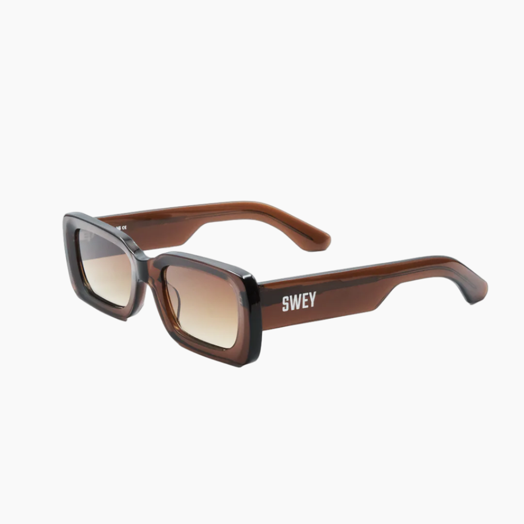 Sunglasses with brown and gray gradient lenses on a white background