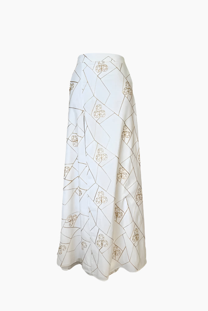 White skirt with gold geometric pattern