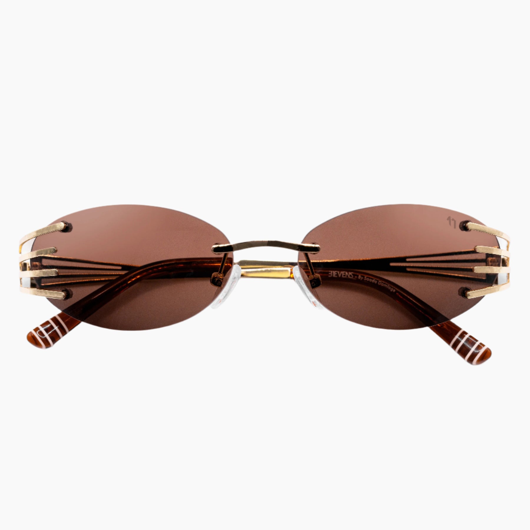 Sunglasses with gold frame and brown lenses