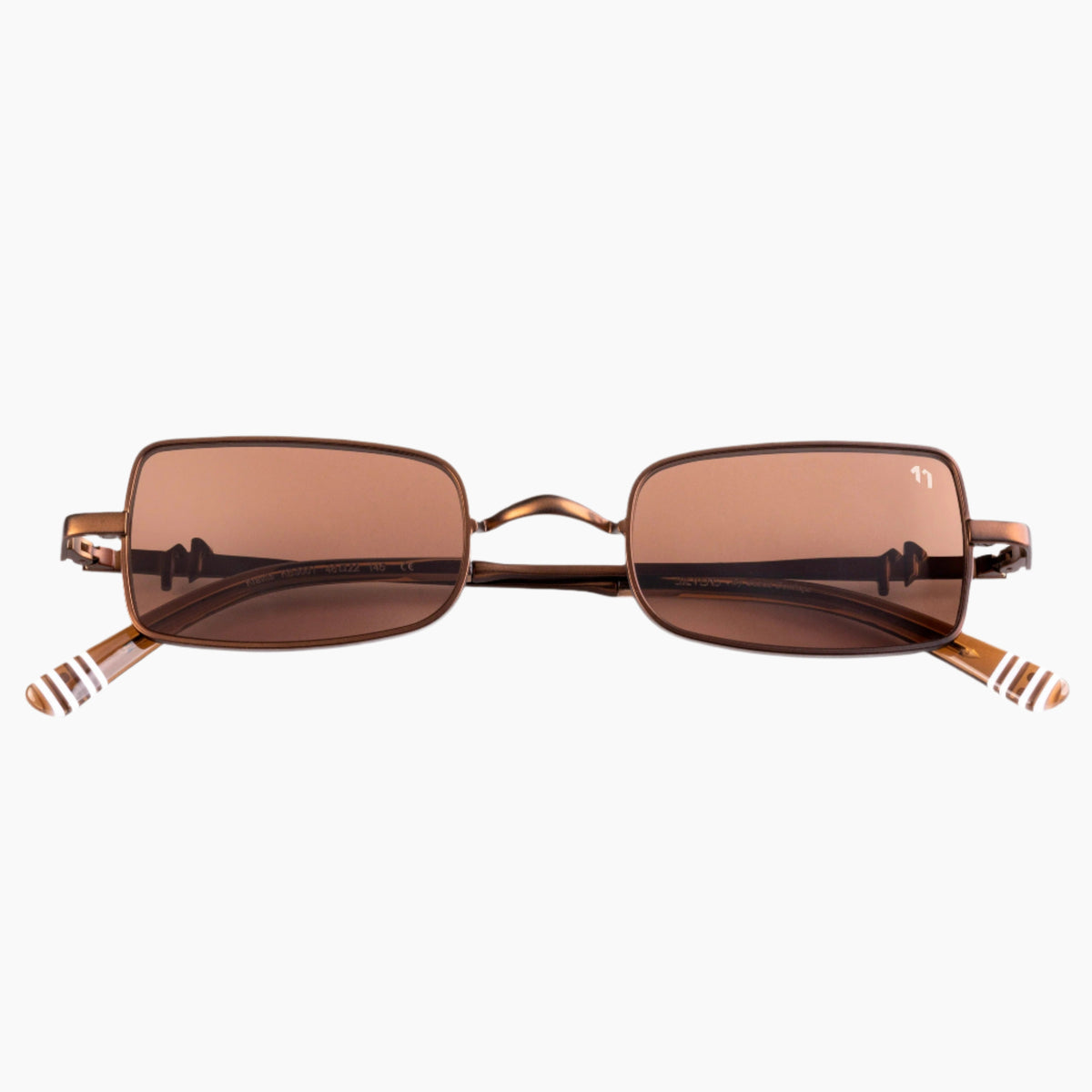 Sunglasses with brown lenses and gold frame