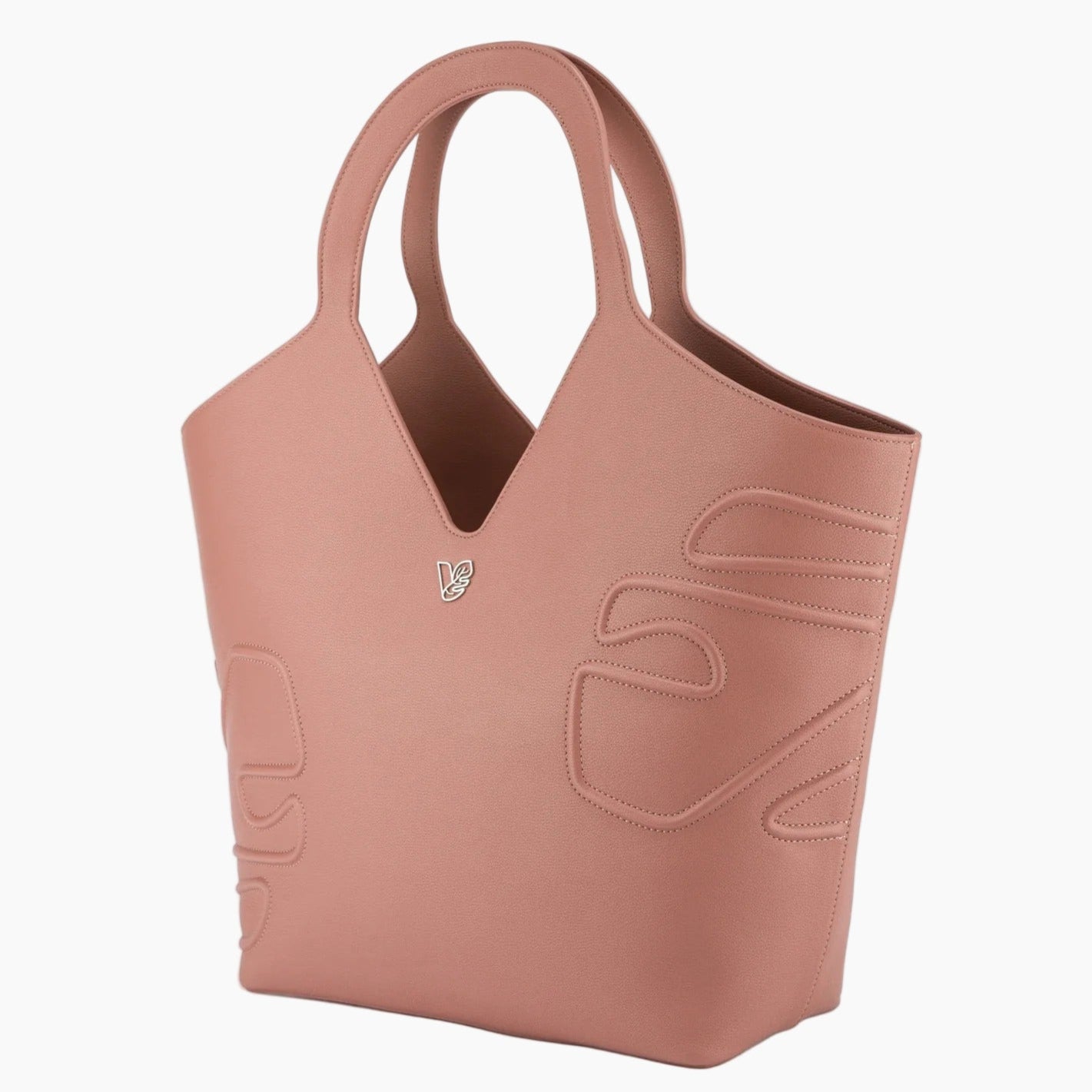 Pink handbag with a subtle design on a white background