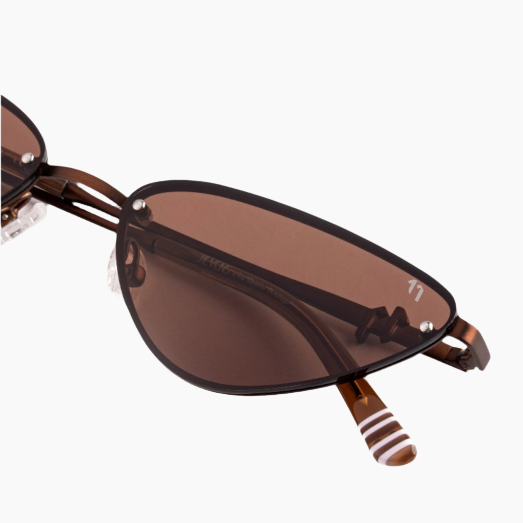 Brown sunglasses with a white background