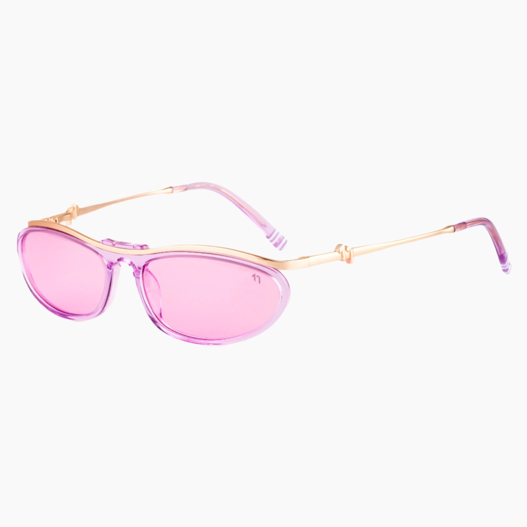 Pink sunglasses with gold frame on a white background