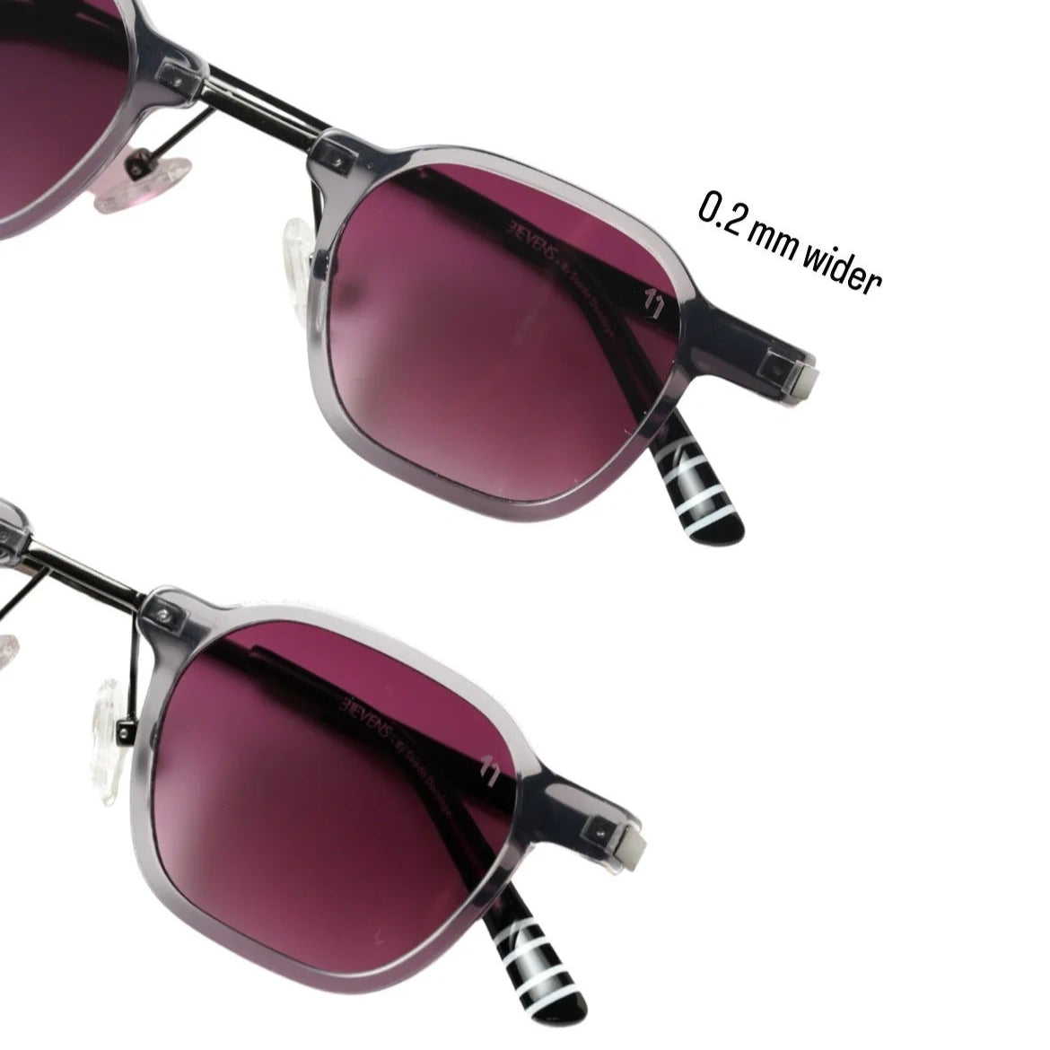 Sunglasses with dark pink lenses and striped arms
