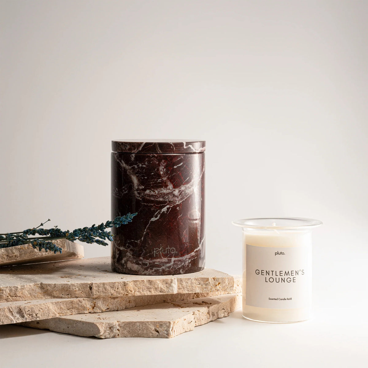 Candle with marble design and 'Gentlemen's Lounge' branding