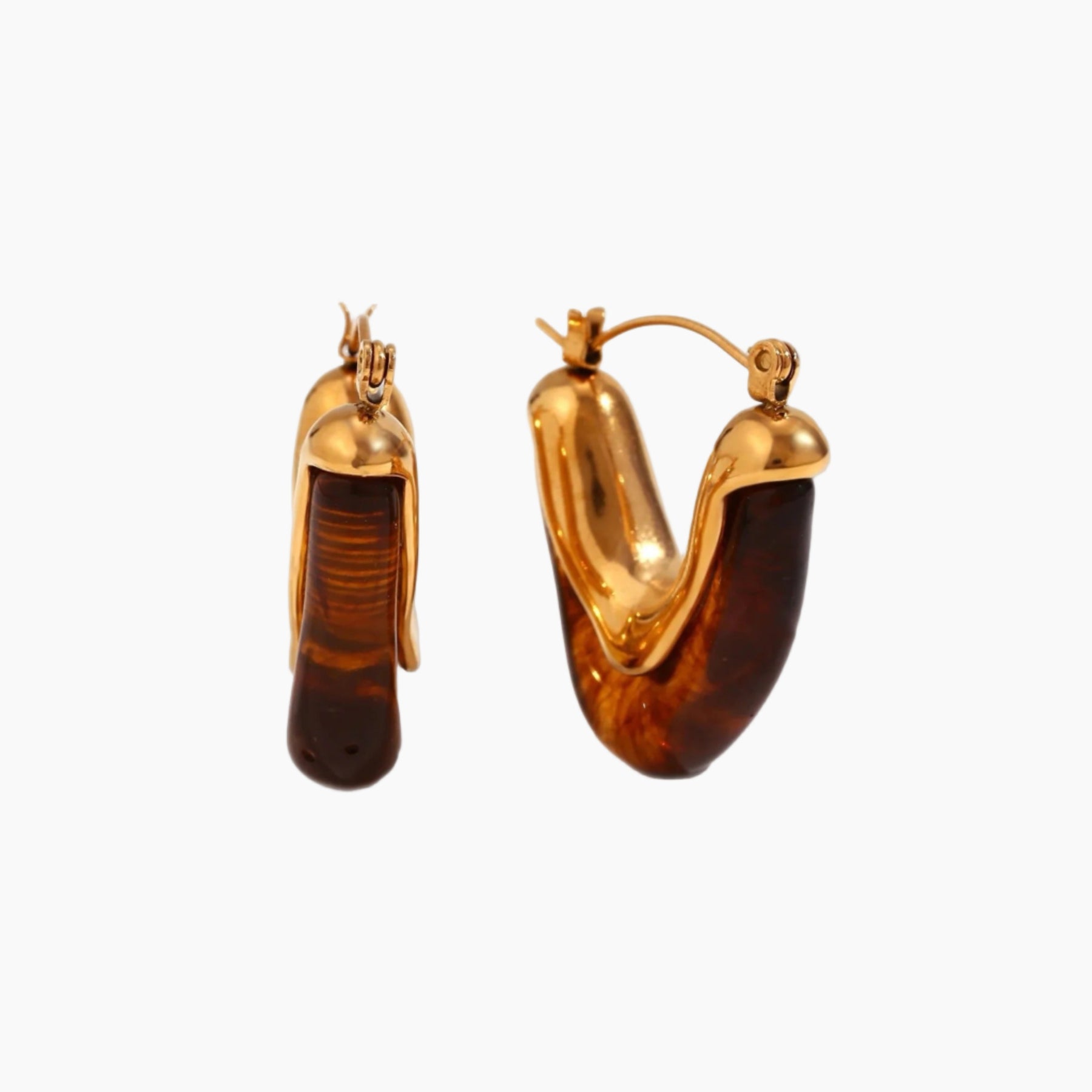 Gold hoop earrings with brown gemstones on a white background