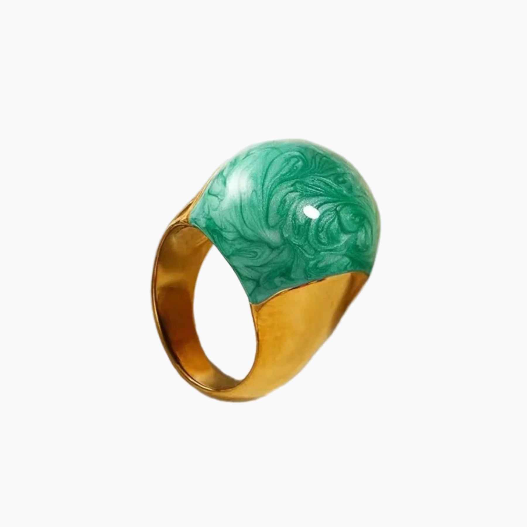 Ring with green patterned stone and gold band on a white background