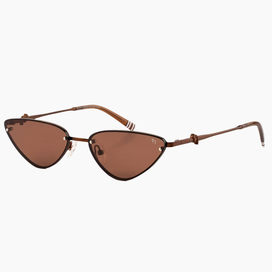 Brown cat-eye sunglasses on a white background