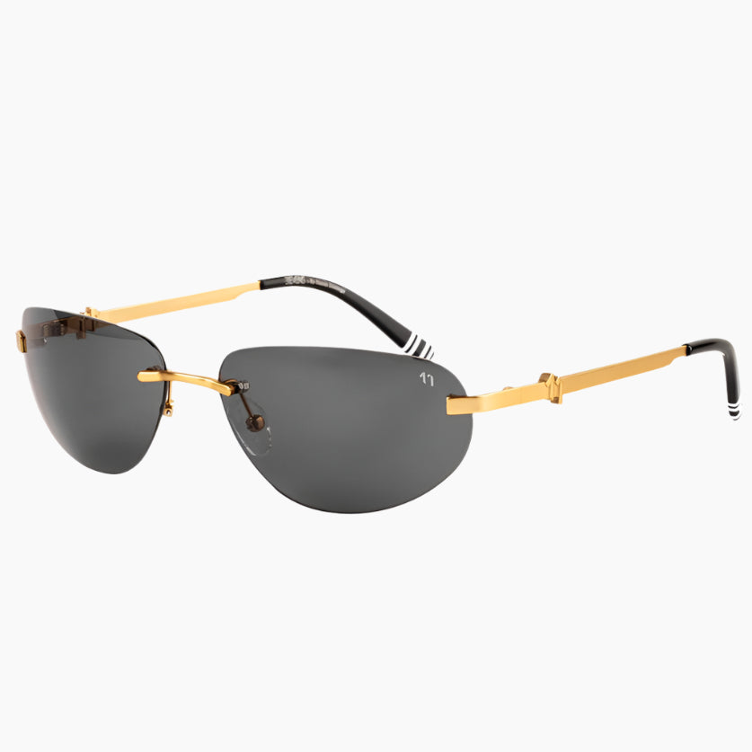 Sunglasses with gold frame and dark lenses