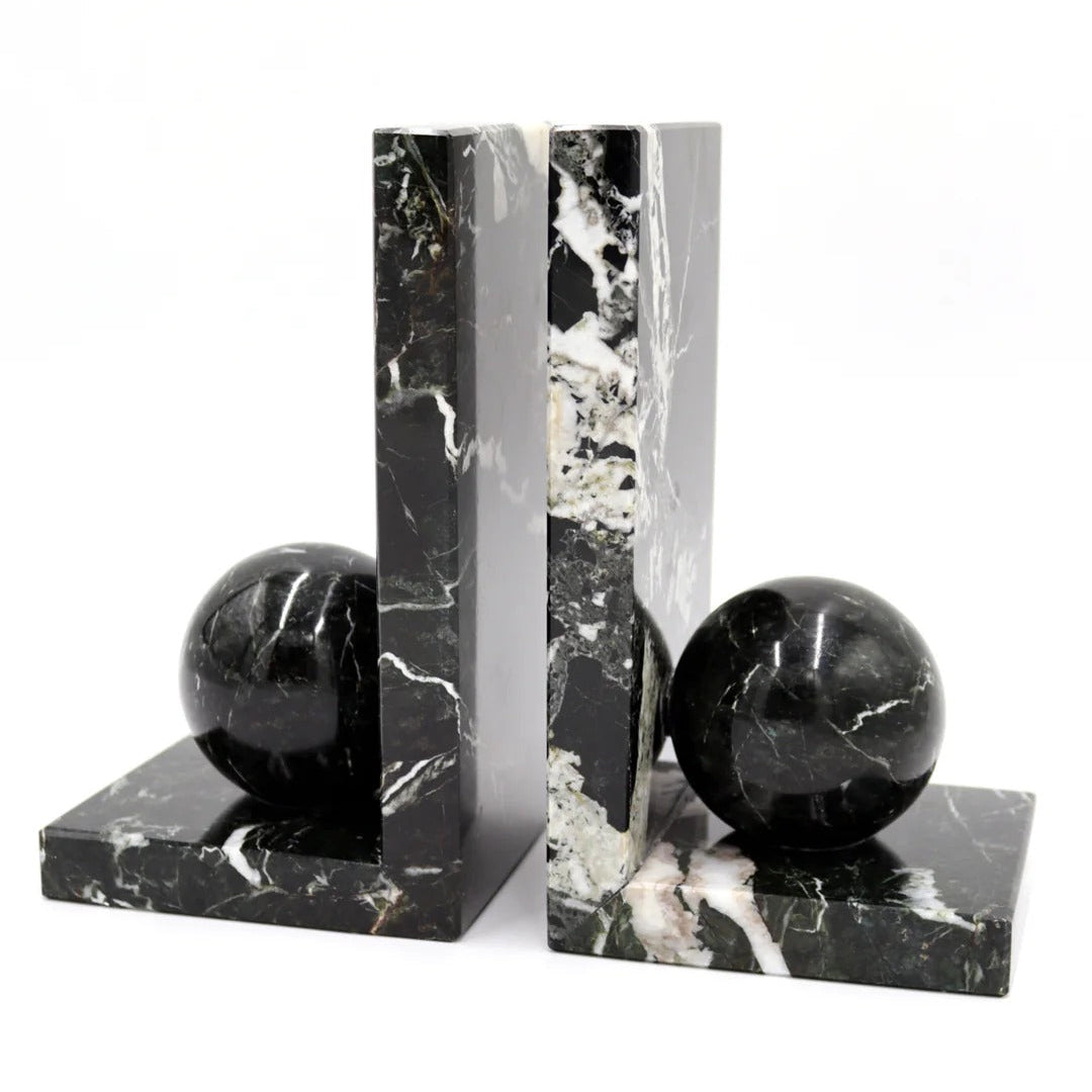 Black marble bookends with spherical ends