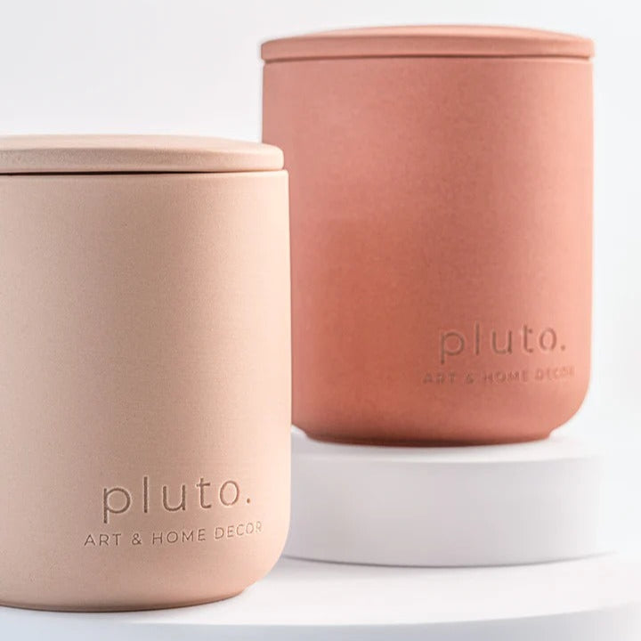 Two terracotta-colored containers with lids on a white background, branded 'pluto'.
